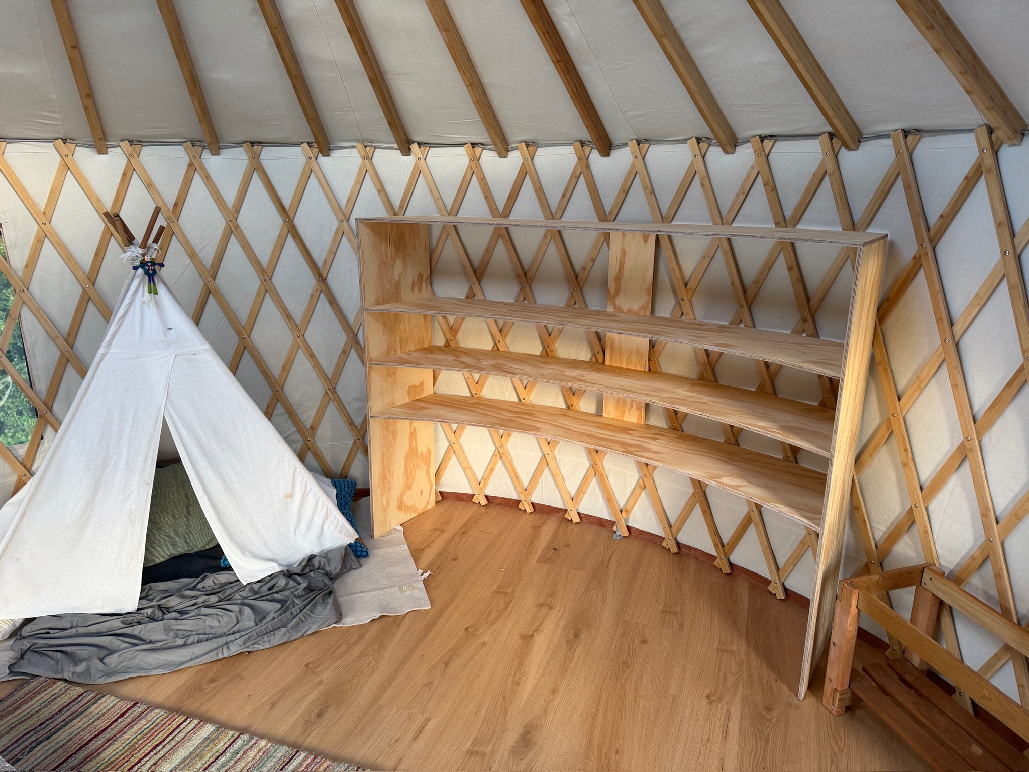 Custom timber shelving built into the lattice wall