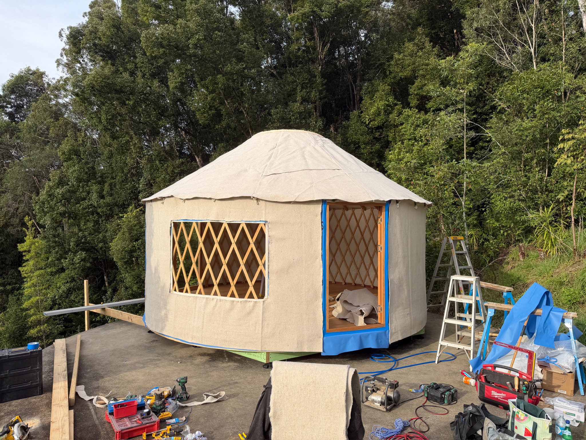 Wool insulation layer being fitted to the canopy