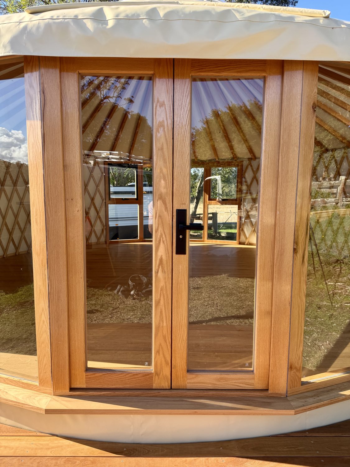 Solid oak entrance to a yoga or meditation space