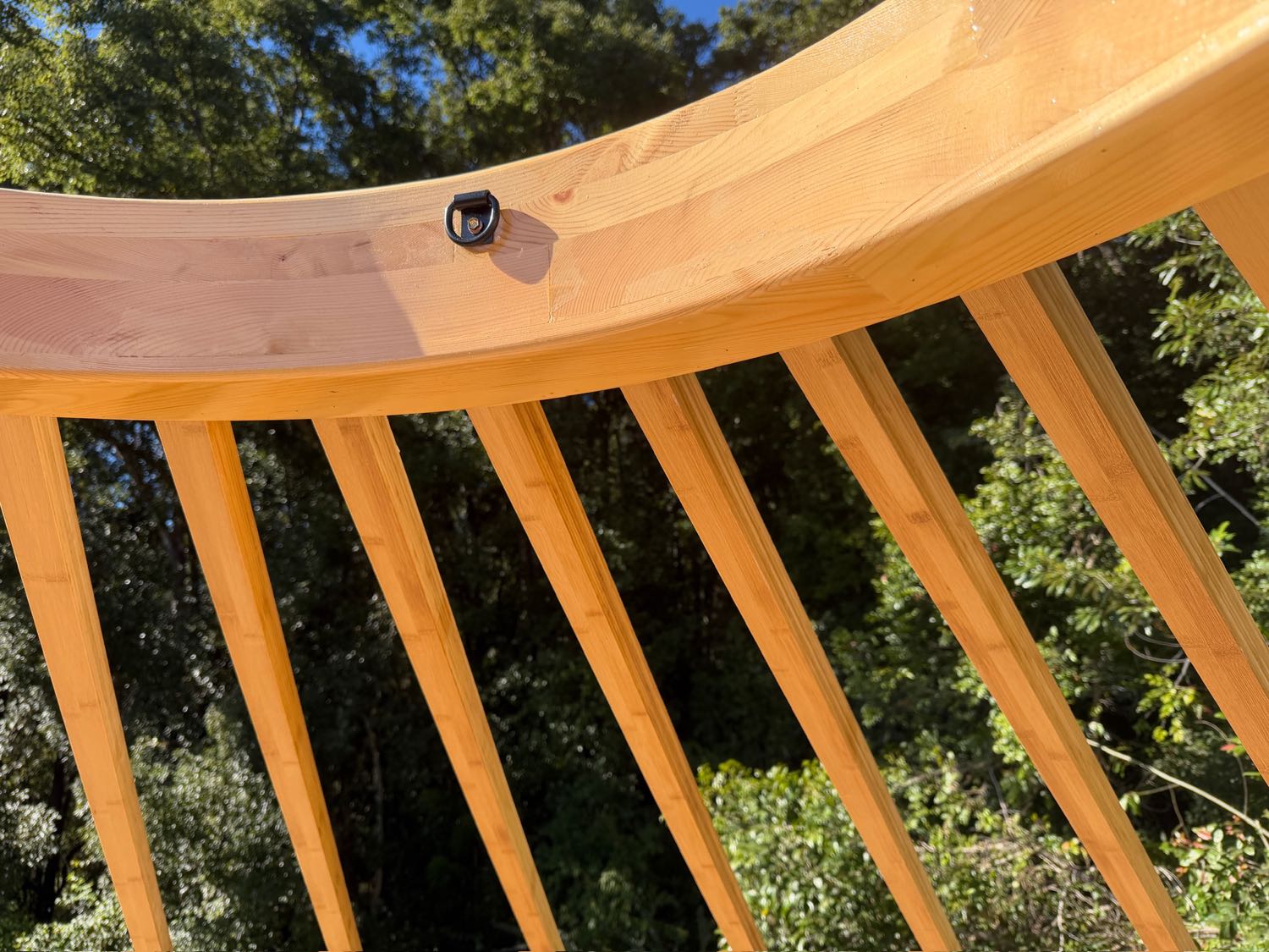 Close up of the solid timber compression ring meeting the bamboo rafters